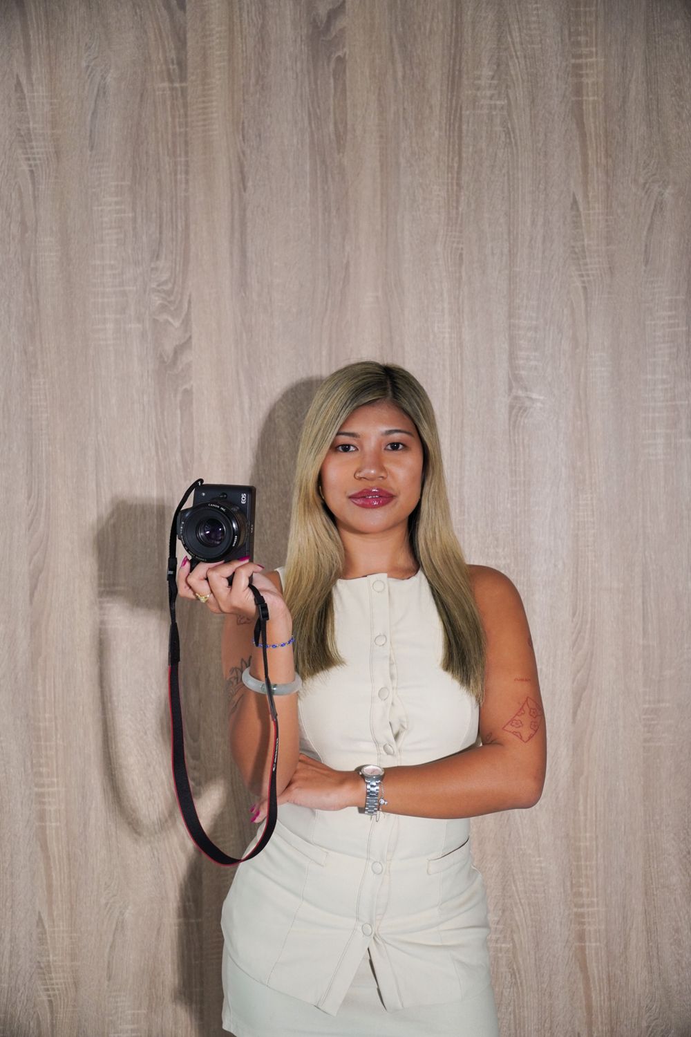 Michelle holding a camera up